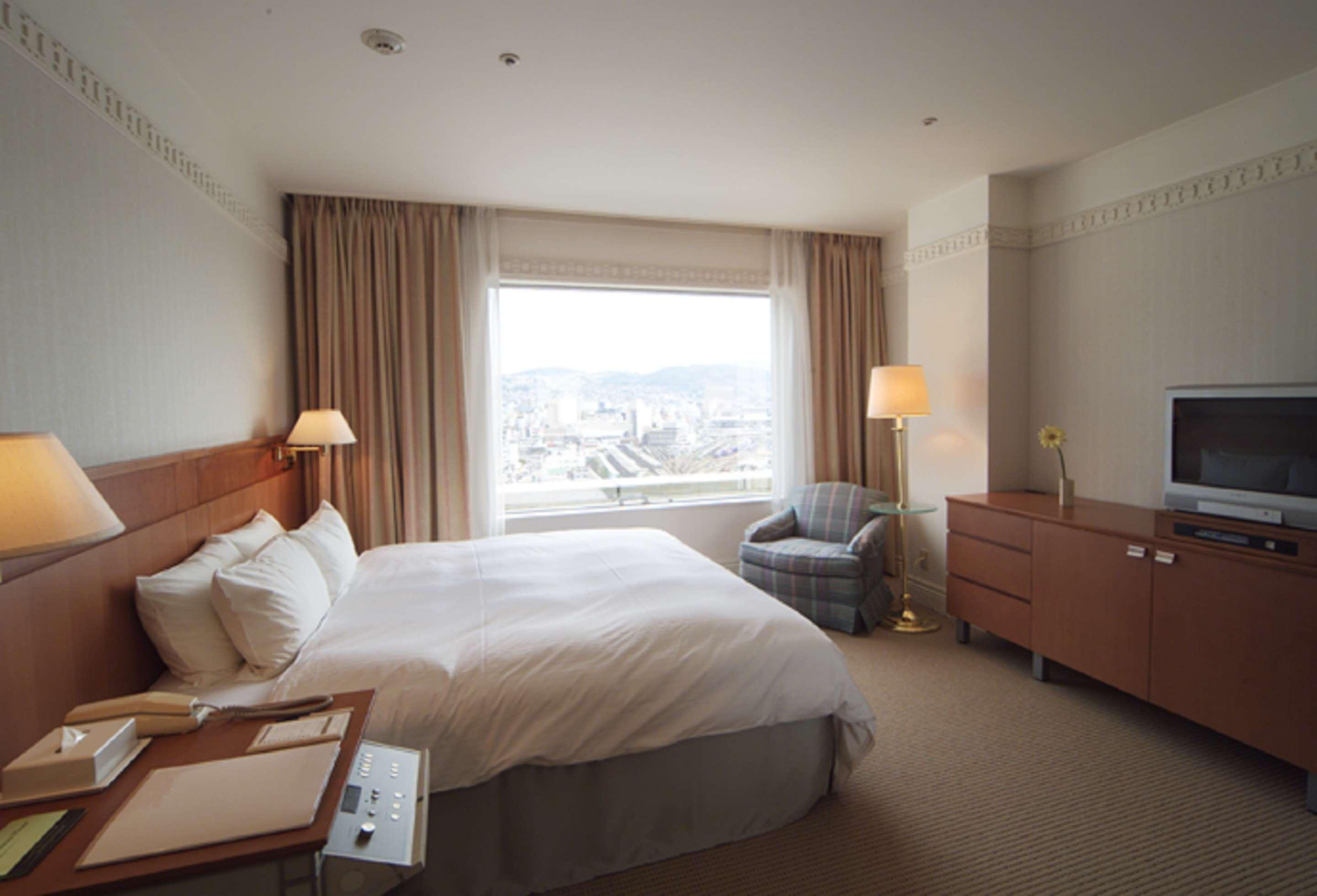 The Global View Nagasaki Hotell Rom bilde A room at the hotel